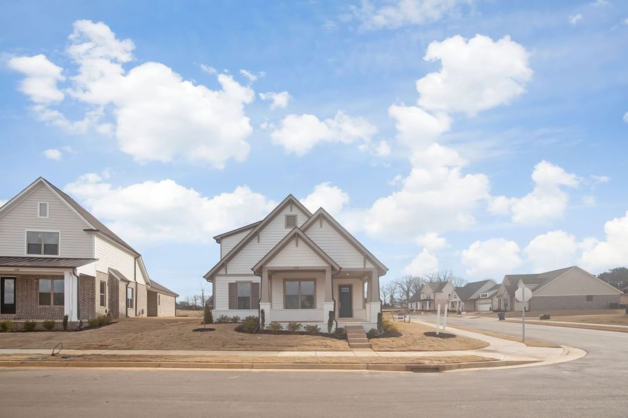 Front exterior of a new home in Twin Oaks, Oakland, TN, highlighting curb appeal (Image 2). Front exterior of a new home in Twin Oaks, Oakland, TN, highlighting curb appeal (Image 2).