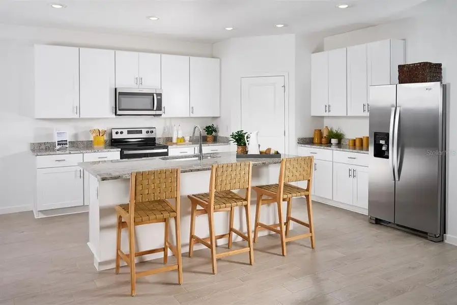 Furnished interior view inside a new home in Colbert Landings, Palm Coast (Image 3).