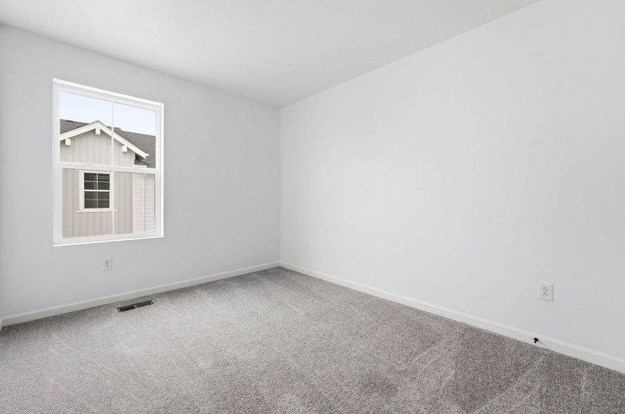 Spacious, unfurnished interior of a new home in Trailstone Townhomes - The Westerly Collection, Arvada (Image 18).
