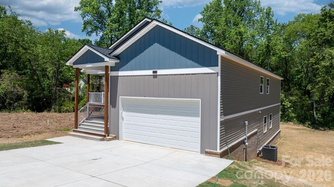 Front exterior of a new home in , Taylorsville, NC, highlighting curb appeal (Image 19).