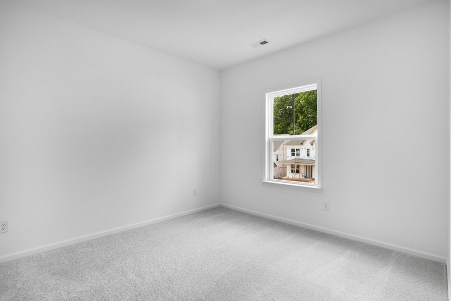 Representative unfurnished interior of a home built from the Leland by Taylor Morrison in Stafford at Langtree, Mooresville (Image 19).