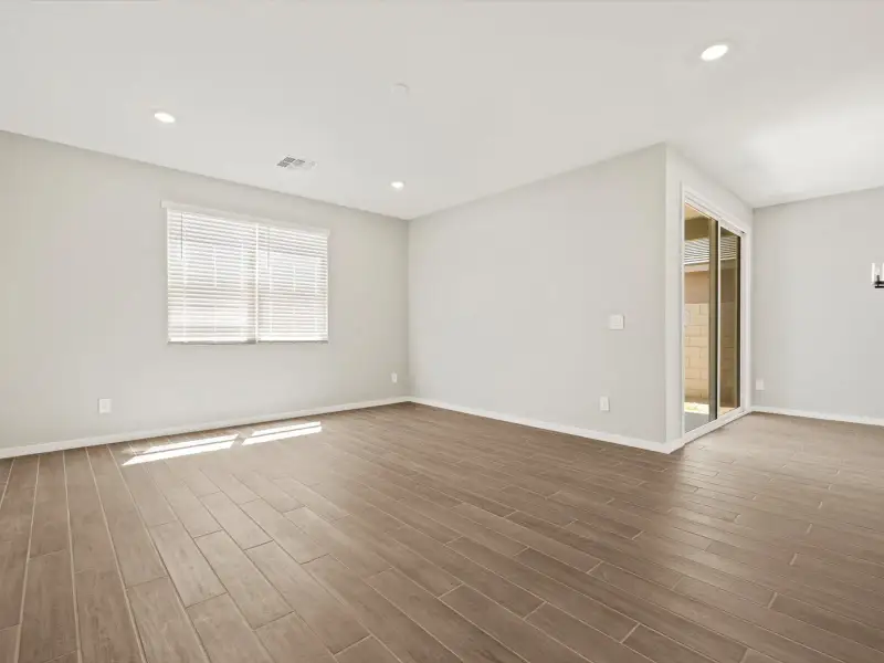 Spacious, unfurnished interior of a new home in Blossom Rock Reserve Series, Apache Junction (Image 9).