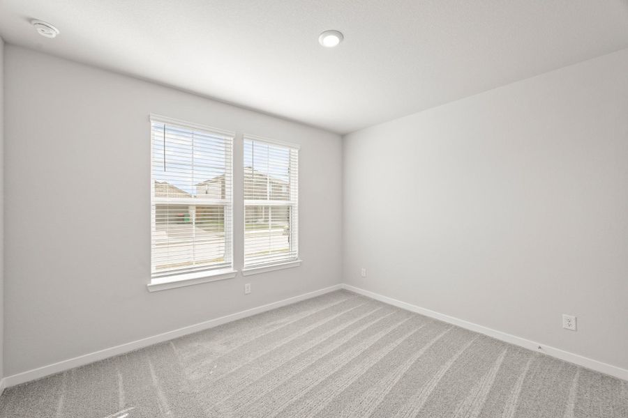 Spacious, unfurnished interior of a new home in Sunterra, Katy (Image 16).