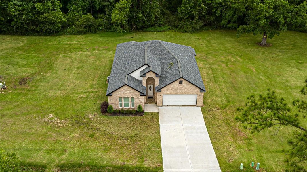 Front exterior of a new home in , Kenefick, TX, highlighting curb appeal (Image 22).
