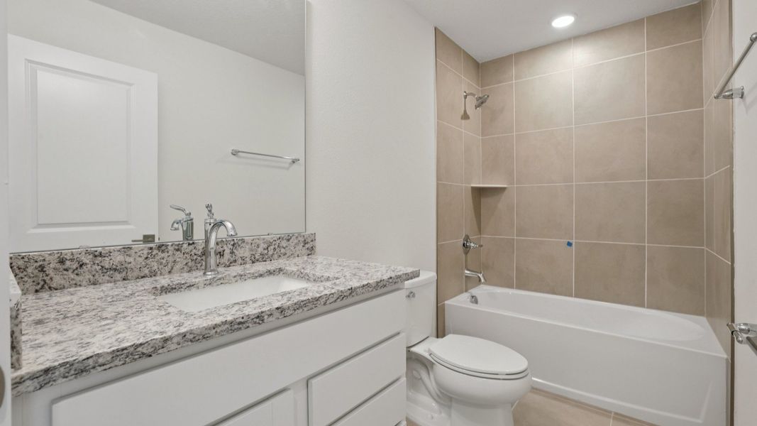 Secondary Bath of the Coronado - End at Cyrene at Harmony located in St Cloud FL by DRB Homes