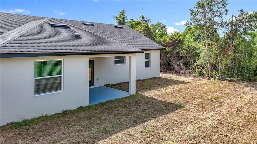 Exterior details and patio area of a home in , Ocala (Image 4).