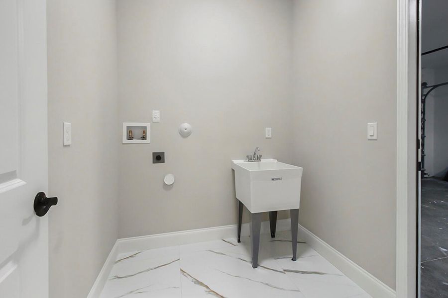 Furnished interior view inside a new home in , Port St. Lucie (Image 8).