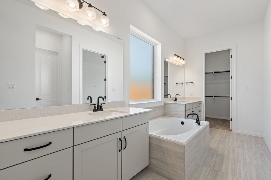 Representative furnished interior of a home built from the Waterville by Ashton Woods in The Trails at Carmel, Pflugerville (Image 43).
