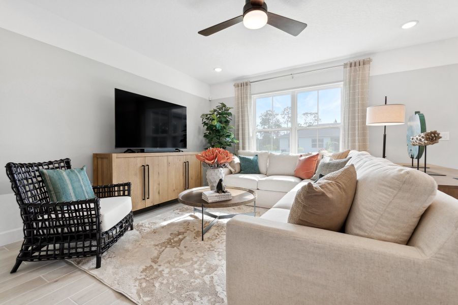 Great room with ceiling fan