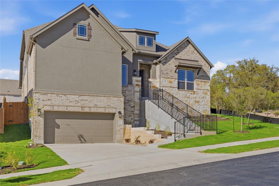 Front exterior of a new home in Retreat at San Gabriel, Georgetown, TX, highlighting curb appeal (Image 18).
