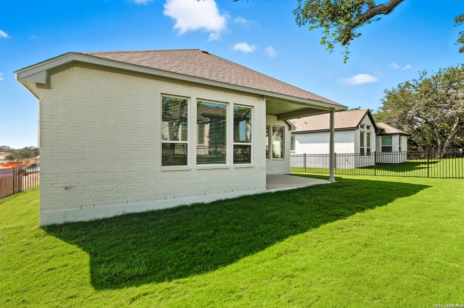 Exterior details and patio area of a home in Prominence, San Antonio (Image 26).