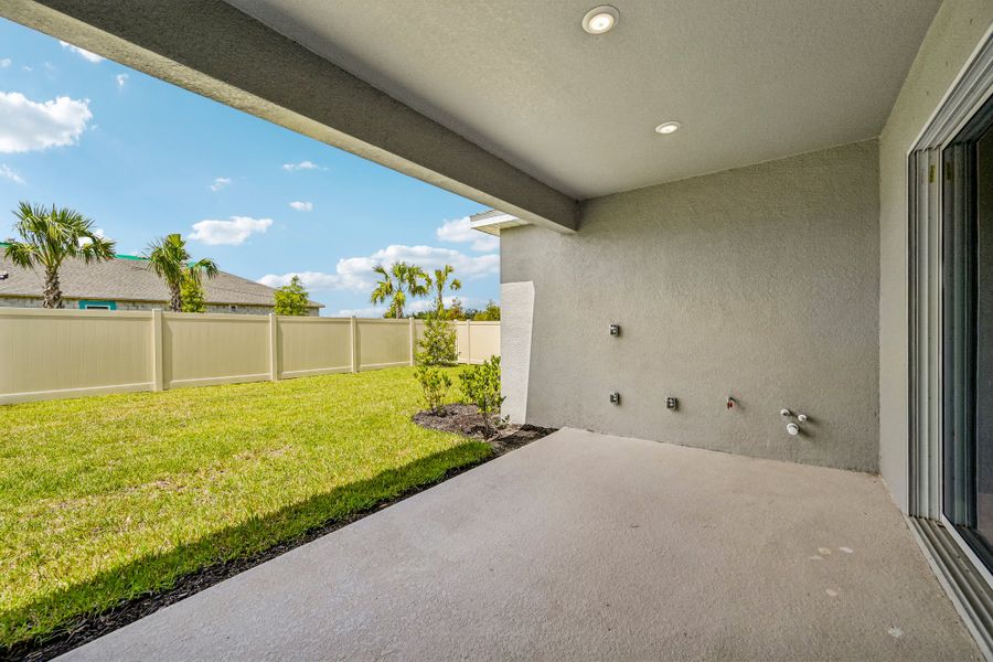 Exterior details and patio area of a home in Firethorn, Parrish (Image 3).