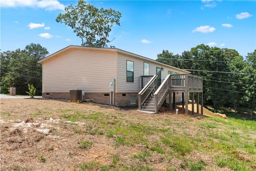 Exterior details and patio area of a home in , Clarkesville (Image 21).