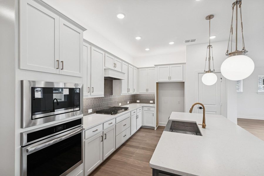 Furnished interior view inside a new home in Meridiana 55' Homesites, Manvel (Image 10).