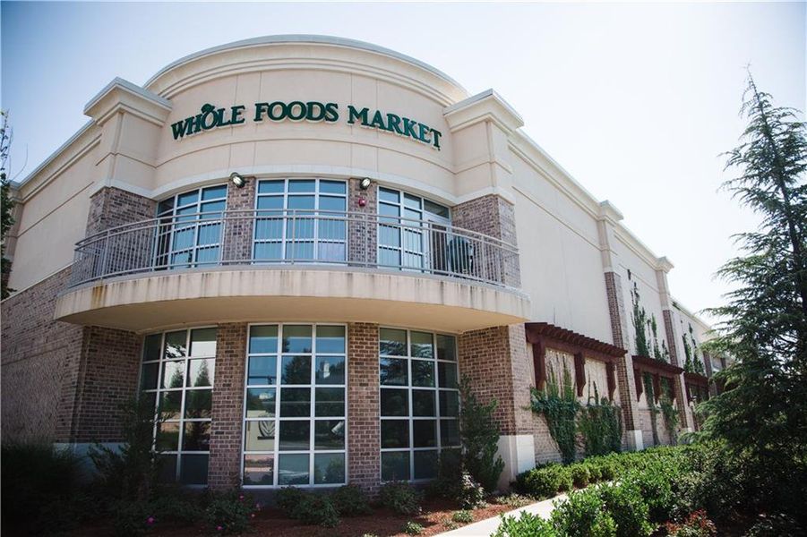 Front exterior of a new home in IveyBrooke, Alpharetta, GA, highlighting curb appeal (Image 28).
