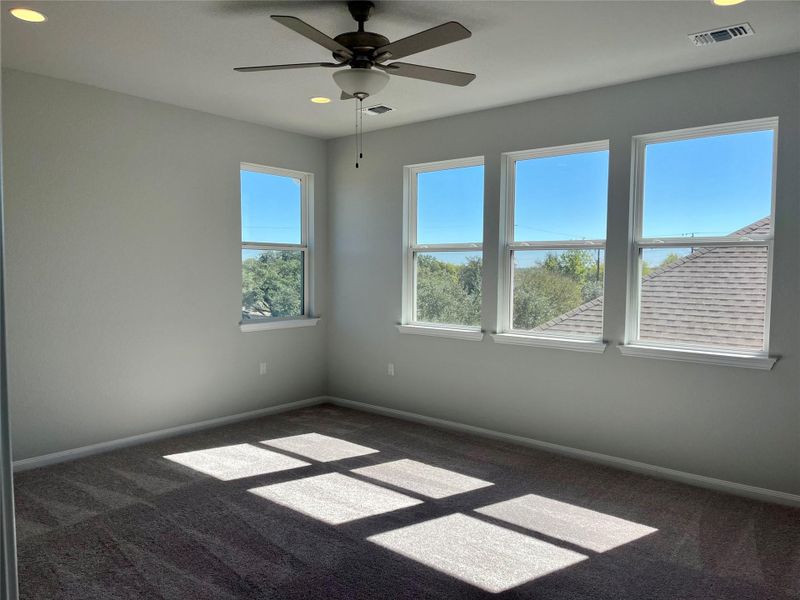 Spare room with recessed lighting, carpet, and ceiling fan