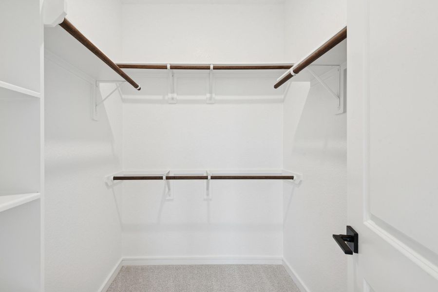 Primary walk-in closet