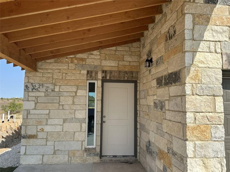 Exterior details and patio area of a home in Porter Country, Buda (Image 14). Exterior details and patio area of a home in Porter Country, Buda (Image 14).