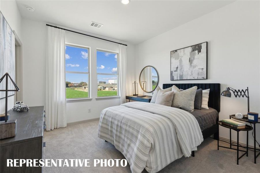 One of two nicely sized secondary bedrooms in our Tatum floor plan.  REPRESENTATIVE PHOTO