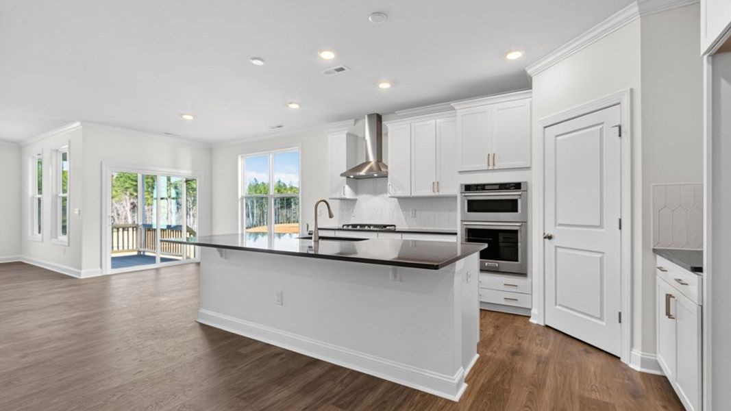 Representative furnished interior of a home built from the Hartwell by D.R. Horton in The Estates Park, Apex (Image 5).