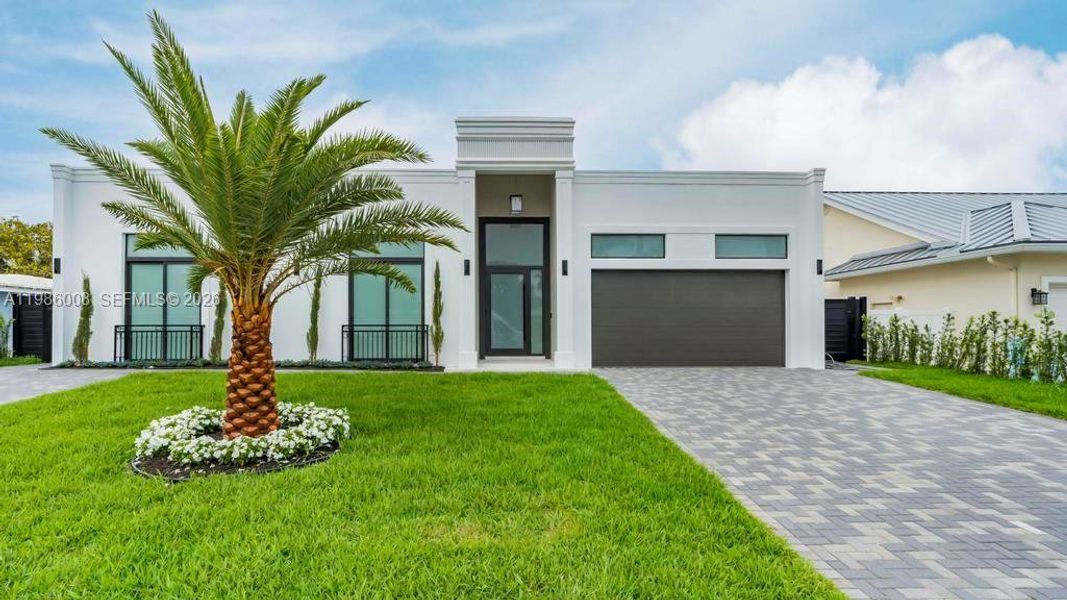 Front exterior of a new home in , Lighthouse Point, FL, highlighting curb appeal (Image 18). Front exterior of a new home in , Lighthouse Point, FL, highlighting curb appeal (Image 18).