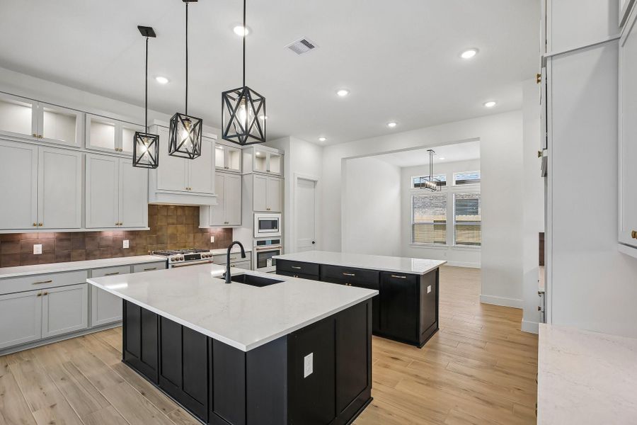 Furnished interior view inside a new home in Riceland 60',65',70', Old River-Winfree (Image 13).
