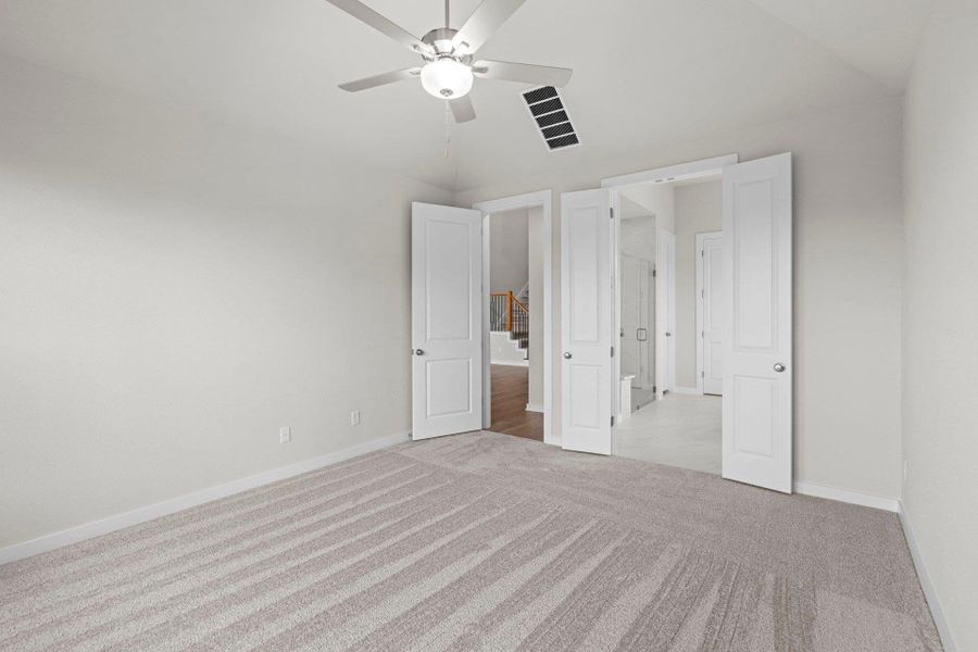 Primary Bedroom with elevated ceiling
