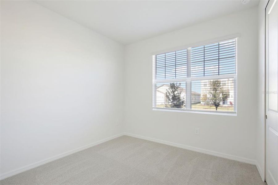 Spacious, unfurnished interior of a new home in Coasterra - Reserve Series, Palmetto (Image 41).