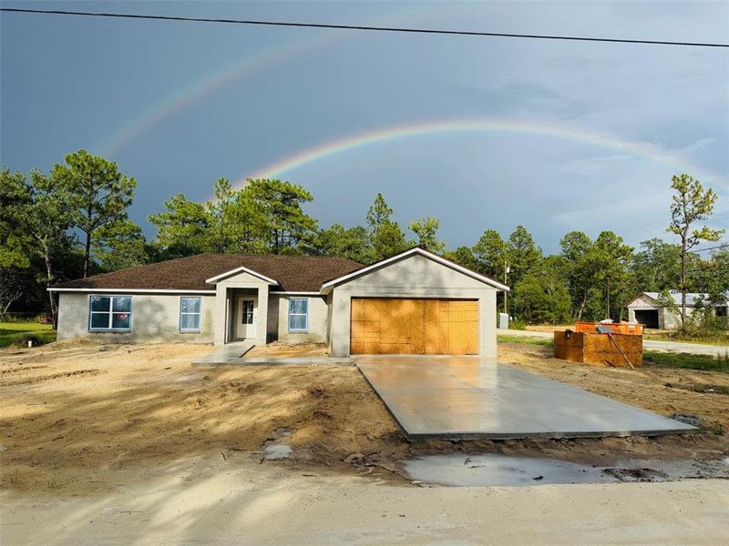 Front exterior of a new home in , Weeki Wachee, FL, highlighting curb appeal (Image 1). Front exterior of a new home in , Weeki Wachee, FL, highlighting curb appeal (Image 1).