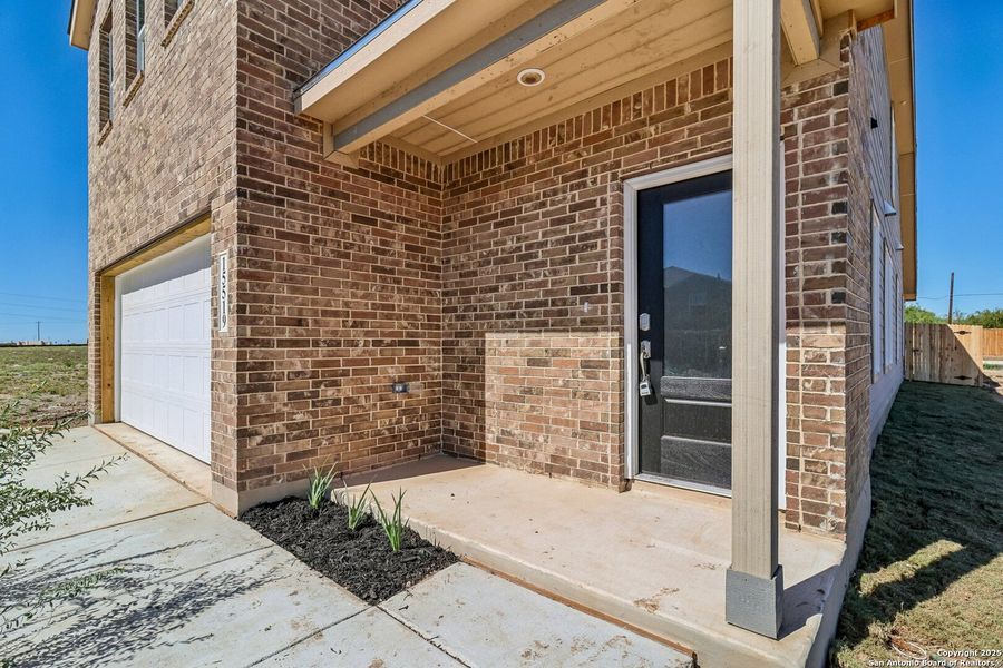 Exterior details and patio area of a home in Summerlin: Eventide Collection, San Antonio (Image 3).