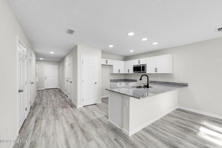 Furnished interior view inside a new home in , Jacksonville (Image 6).