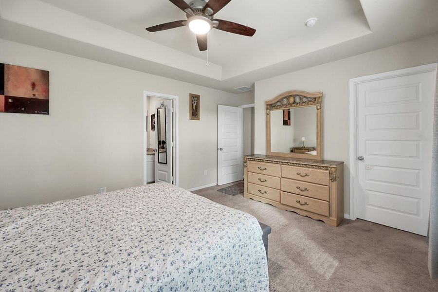 Another view of the primary bedroom