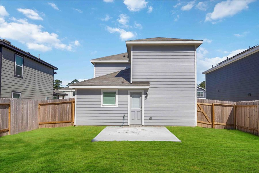 Exterior details and patio area of a home in Townsend Reserve, Splendora (Image 4). Exterior details and patio area of a home in Townsend Reserve, Splendora (Image 4).