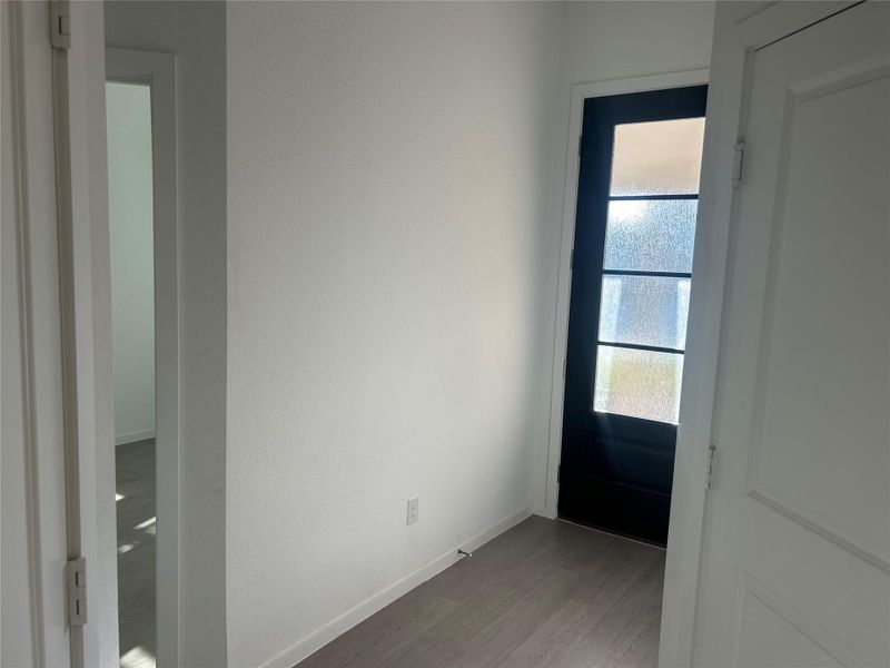 View of the high ceiling and front entry. View of the high ceiling and front entry.