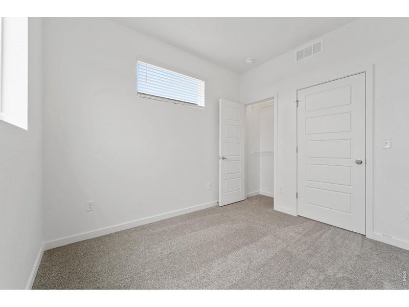 Spacious, unfurnished interior of a new home in Liberty Draw, Evans (Image 19).