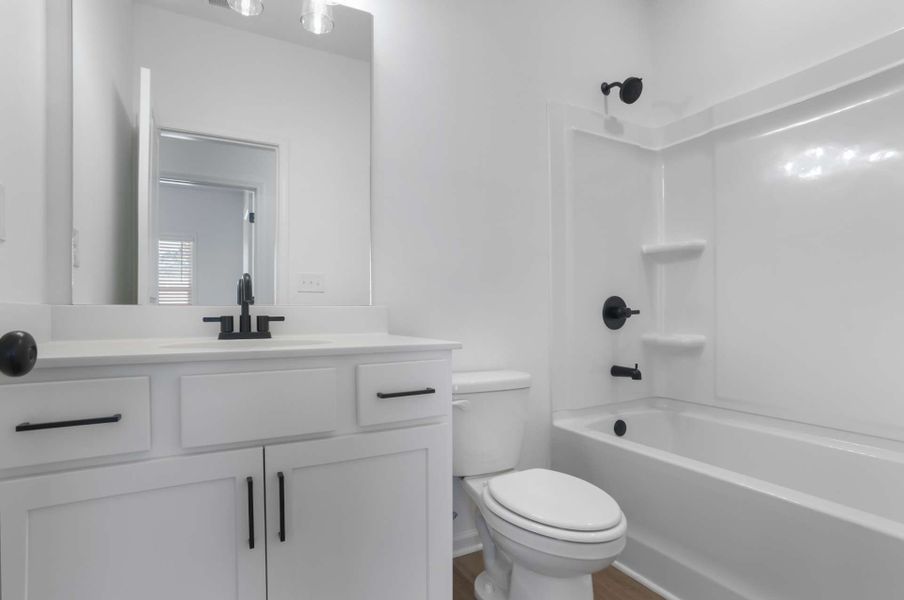 Representative furnished interior of a home built from the Khloe by KM Homes in The Cottages at Jackson Heights, Cleveland (Image 12).