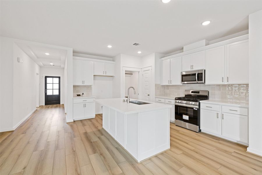 Furnished interior view inside a new home in Sunterra, Katy (Image 10). Furnished interior view inside a new home in Sunterra, Katy (Image 10).