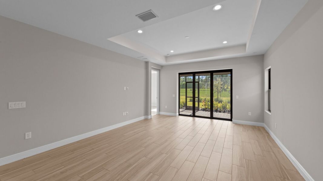 Spacious, unfurnished interior of a new home in SkySail, Naples (Image 15).