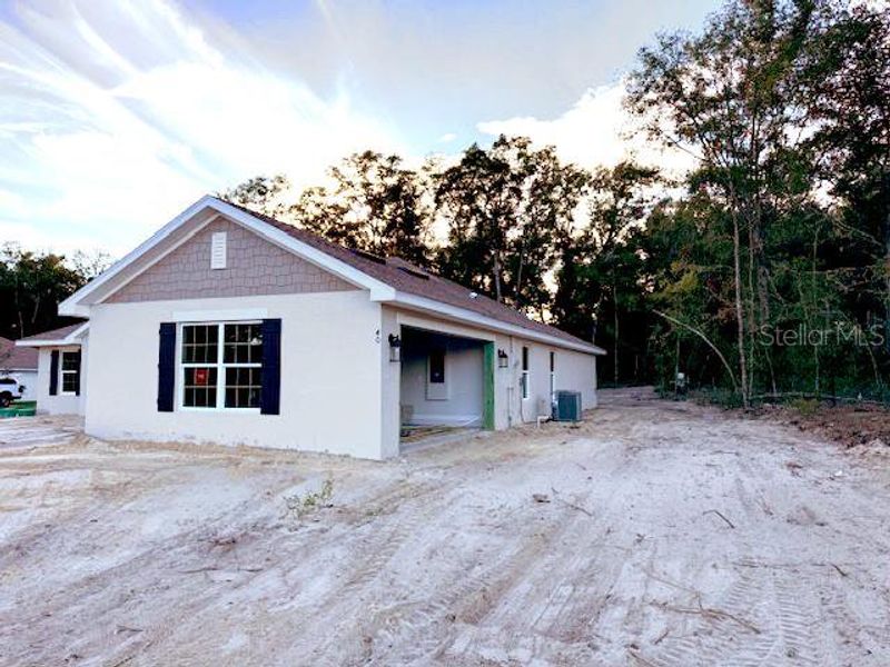 2557 sq ft model Craftsman Elevation.  These are side entry garages.