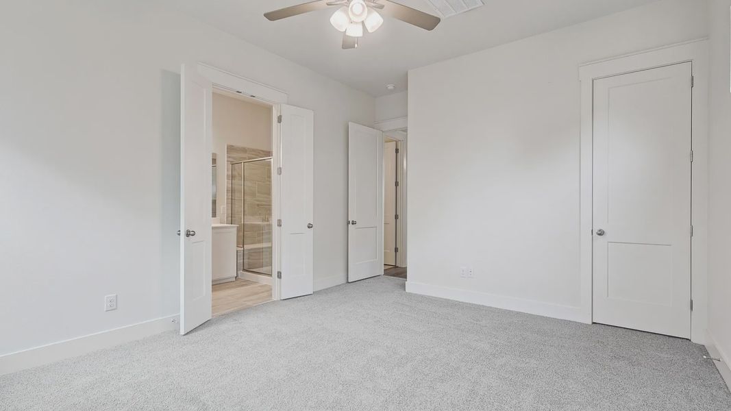 Furnished interior view inside a new home in Collin Creek, Plano (Image 17).