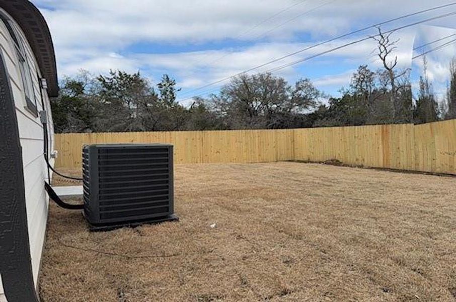 View of yard featuring central air condition unit View of yard featuring central air condition unit