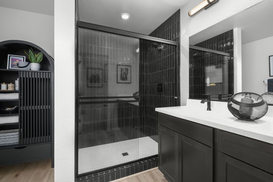 Walk-in shower at primary bath Walk-in shower at primary bath