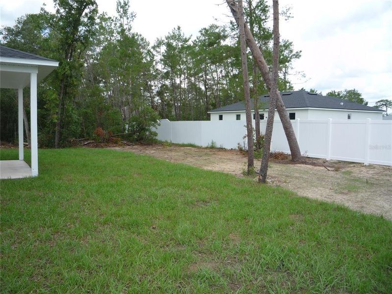 Exterior details and patio area of a home in , Ocala (Image 25).