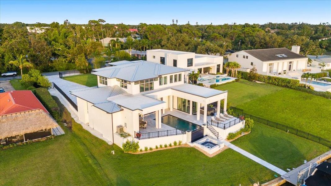 Front exterior of a new home in , Osprey, FL, highlighting curb appeal (Image 18).