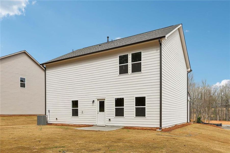 Exterior details and patio area of a home in The Pointe at Heron Bay, Locust Grove (Image 3).