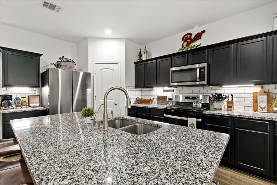 Furnished interior view inside a new home in Harrington Trails at The Canopies, New Caney (Image 12). Furnished interior view inside a new home in Harrington Trails at The Canopies, New Caney (Image 12).