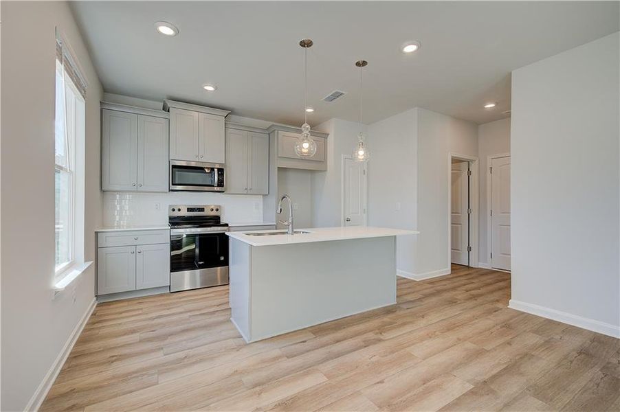 Furnished interior view inside a new home in Enclave at Evergreen, Fairburn (Image 3).
