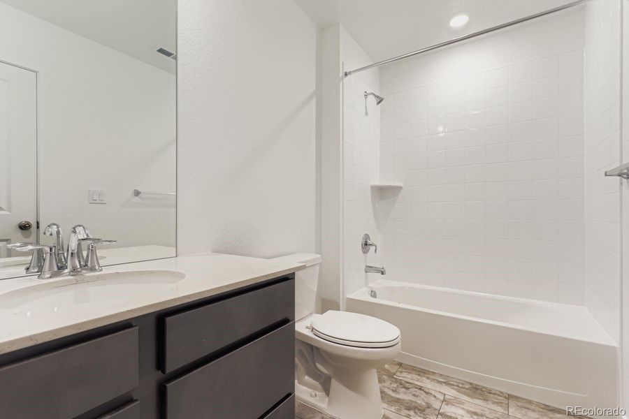 Furnished interior view inside a new home in Parterre, Thornton (Image 7).