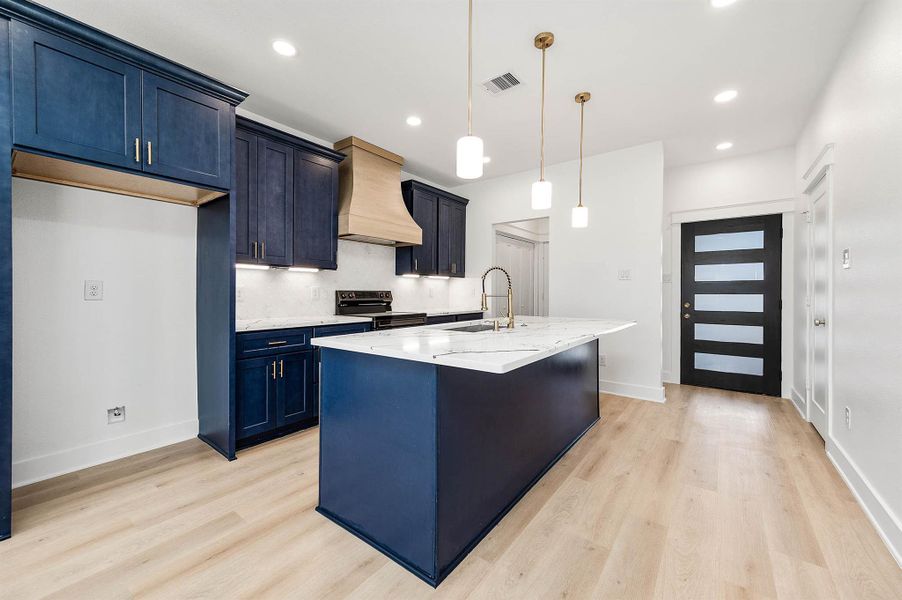 Alternate view highlighting the pendant lighting for a warm, elegant touch.