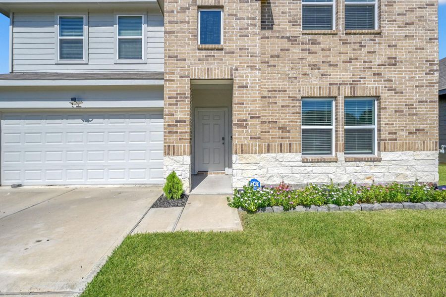 Exterior details and patio area of a home in Summerwood Trails, Willis (Image 2). Exterior details and patio area of a home in Summerwood Trails, Willis (Image 2).